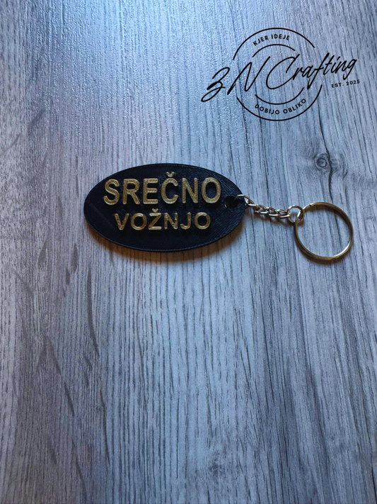 🔑 Obesek Srečno vožnjo – majhen talisman na poti